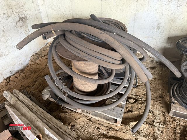 Lot 1-18288 - Large lot of assorted hoses, includes 2" OD, 1.5" SAE, 100R4 Flame resistant hoses, hydraulic, and m...