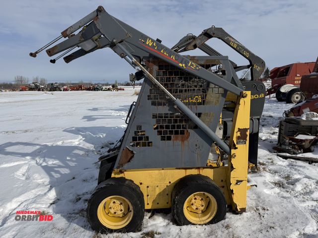 Lot 1-11521 - (1) New Holland LS125 skid steer, missing engine, frame only, S/N 145248.