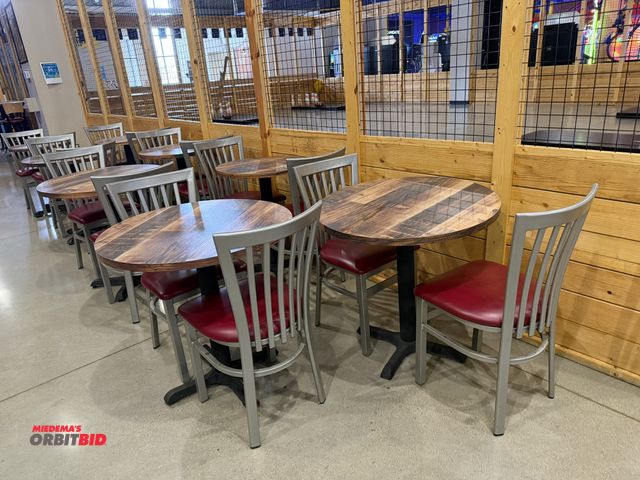 Lot 1-11166 - (8) 30" diameter x 29" tall metal framed café tables with wood grain colored formica tops, and (16) ...