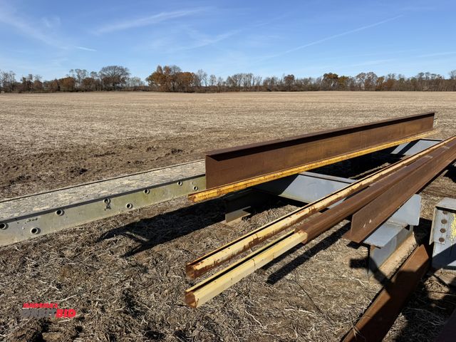 Lot 1-2943 - Lot of assorted steel, includes I-beam, 5" x 14" x 241", and 28' aluminum pick (may be bent), does n...