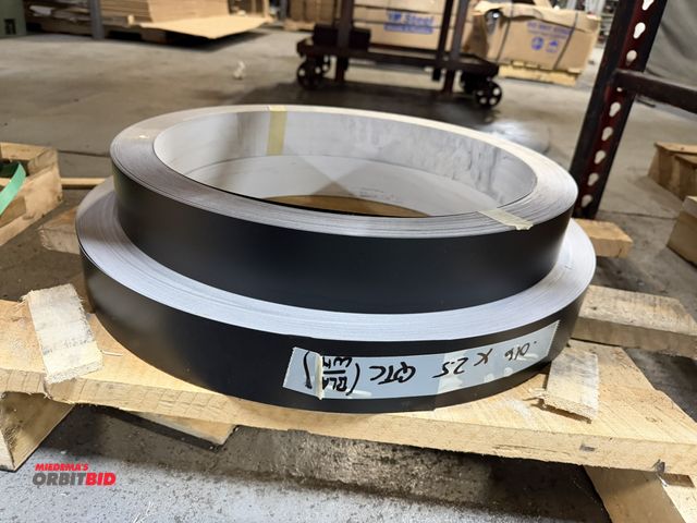Lot 1-18670 - (1.5) coils of 2.5" x .016" PPB, pre painted black anodized aluminum coils.