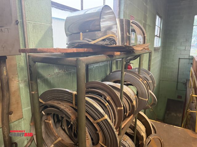 Lot 1-18785 - (1) 70" length x 64" height x 15" depth steel tube, 3-tier rack full of anodized aluminum rolls, col...