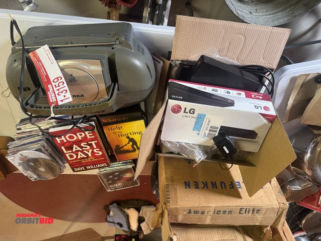 Lot 1-3159 - (1) Radio, DVDs, (1) DVD player, records, CD's, and more.