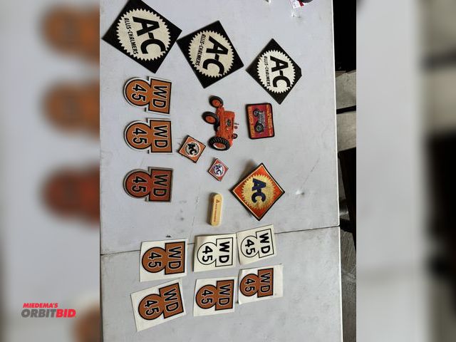 Lot 1-12289 - (1) Assorted Allis-Chalmers items including stickers and patches