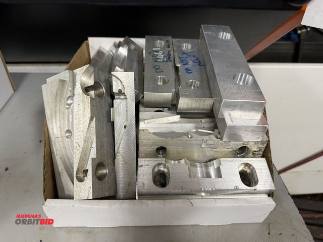Lot 1-11077 - Large lot of assorted used aluminum vise jaws.