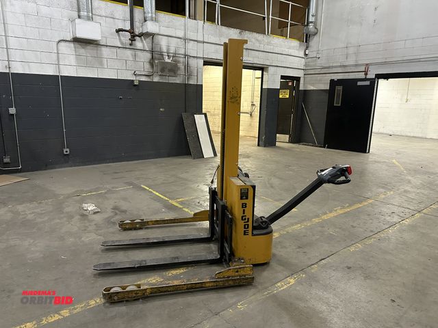 Lot 1-2859 - (1) Big Joe model S-22-62 24 bolt electric walk behind pallet jack, 2200 lb. max capacity, 24" load ...