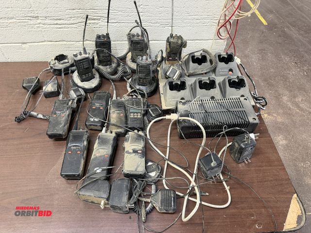 Lot 1-16226 - Lot of assorted Motorola hand held radios with a 6-bay charging station, and (1) Astec, model AA1660...
