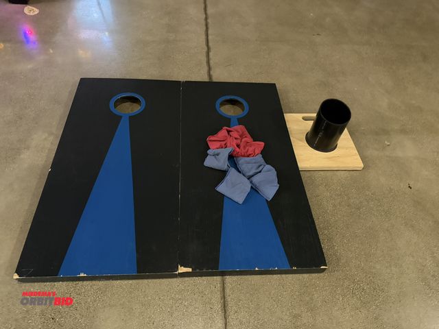 Lot 1-11196 - (2) 23-1/2" length x 47" height wood corn hole boards with (4) blue and (4) red bean bags and (1) cu...