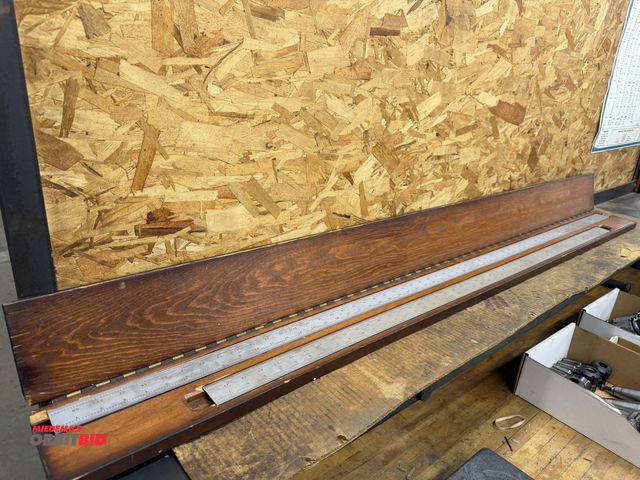Lot 1-1663 - (1) AL Warden 48" straight edge and (1) 60" straight edge with wood cases.