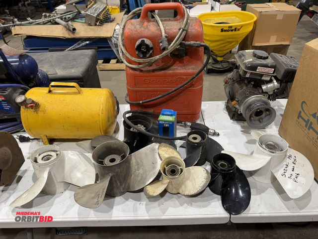 Lot 1-18637 - Large lot of assorted boat motor  props, and (1) Scepter outboard gas tank.