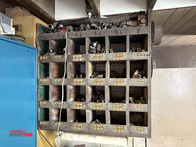 Lot 1-18559 - Contents of wood organizer, includes assorted pipe fittings, elbows, 90° caps, reducers, and more, c...
