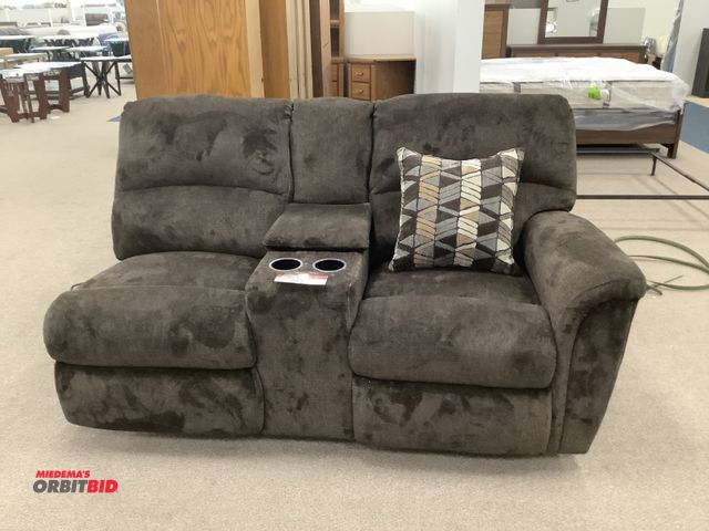 Lot 1-17245 - Brown reclining love seat. 67” by 36” deep