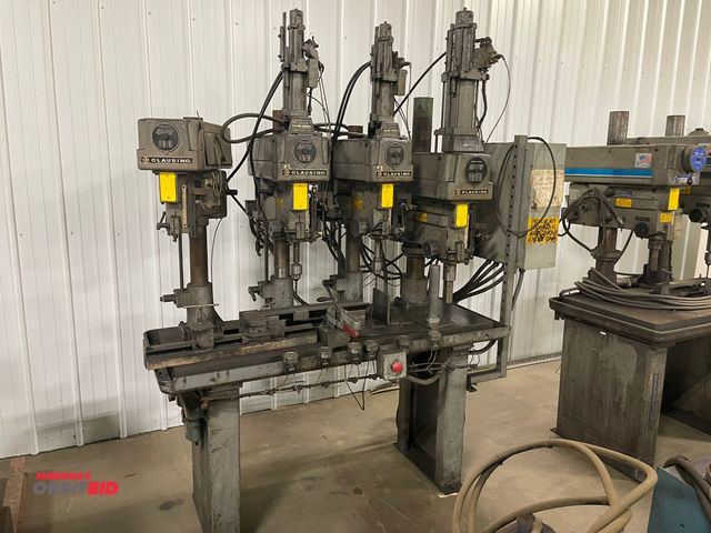 Lot 1-11877 - (1) Clausing 4-head multi drill press with (1) model 2217, (2) model 1617, and (1) unknown model dri...