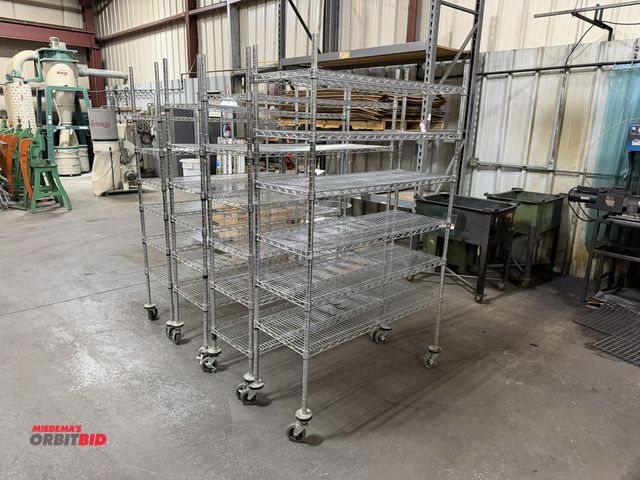 Lot 1-18666 - Lot of (4) rolling Metro style carts, 48" x 18" x 77" tall.