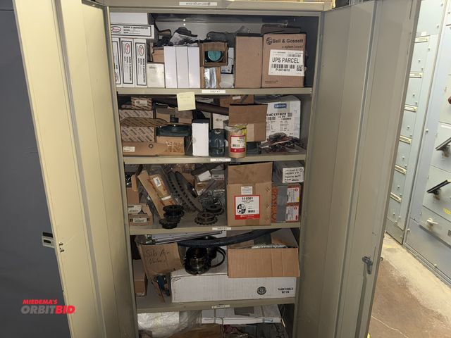 Lot 1-16995 - (1) 36" width x 78" height x 24" depth 2-door steel cabinet with contents, including various gears, ...