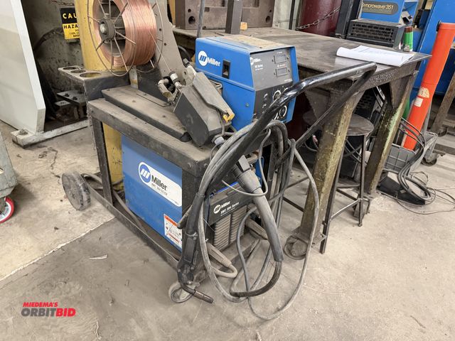 Lot 1-1632 - 1997 Miller XMT-304 MIG Welder 300-Amp, Mig Gun, Remote 60 Series Wire Feed. (Does Not include tank)