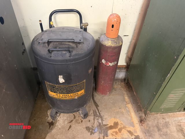 Lot 1-18794 - (1) 21-gallon Central Pneumatic air compressor tank (no compressor), and (1) acetylene tank, appears...