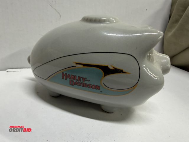 Lot 1-8314 - (1) approx. 6" long x 3.5" tall, collectible, porcelain Harley Davidson hog bank.