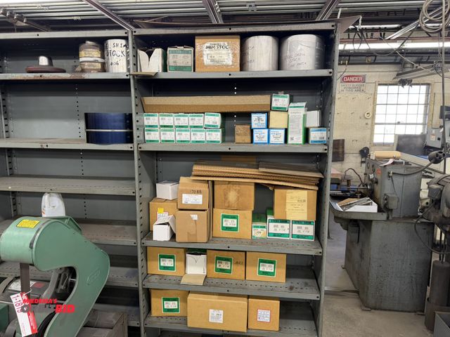 Lot 1-1820 - Large lot of assorted steel shim stock, and (1) adjustable metal shelving unit, 74" x 12" deep x 87"...