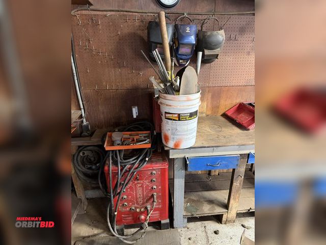 Lot 1-12118 - (1) Forney stick welder, includes (4) assorted welding helmets, rod, parts, and accessories.