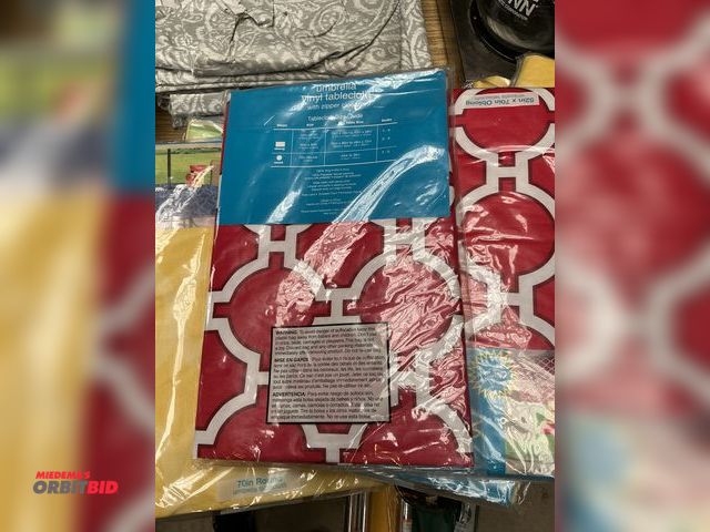 Lot 1-12535 - Umbrella vinyl tablecloth’s (15) new in package, (6) opened &amp; used plus 1 - 60in round fabric ta...