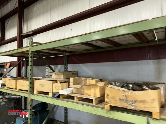 Lot 1-19243 - Entire content of items shown on shelf, includes various shaft adapters, MFA spacers (various sizes)...