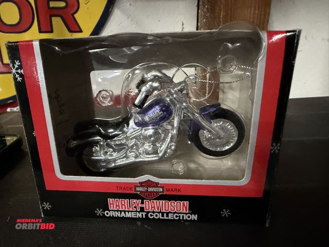 Lot 1-8254 - (1) Harley Davidson North Pole Motorcycle Club Collectors ornament (shaped like a motorcycle).