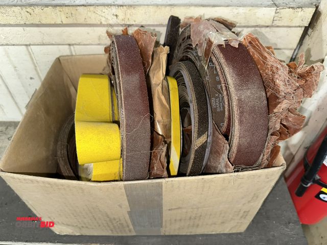 Lot 1-17707 - Large lot of assorted sanding belts, ranging in size between approx. 1/2" wide and 1.5" wide.