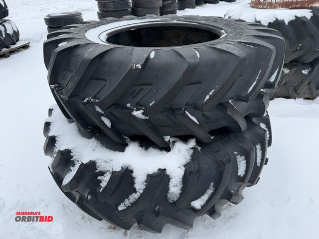 Lot 1-11638 - (1) Michelin 16.9R28 tire, tire has sidewall cracks and weather checks, and (1) Titan 18.4-30 tire m...