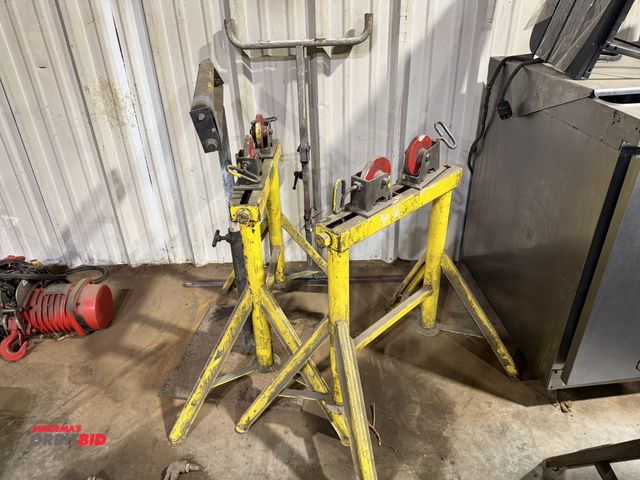 Lot 1-1534 - Set of (2) 28" height with adjustable width pipe roller stands, (1) 24" wide adjustable height rolle...