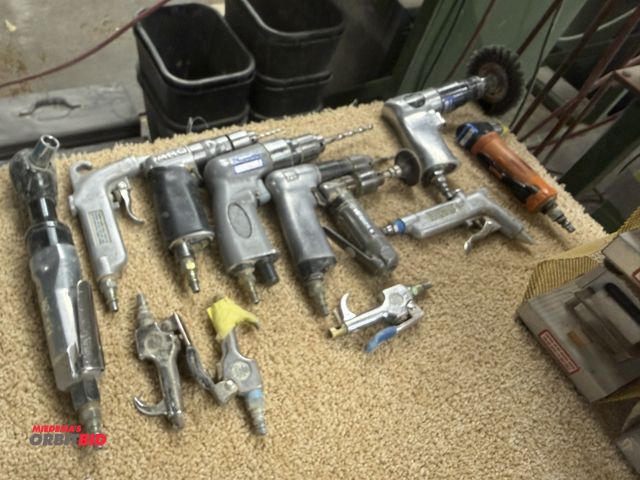 Lot 1-16447 - Lot of assorted pneumatic hand tools, includes drills, NAPA ratchet, air chucks, brands include ARO,...