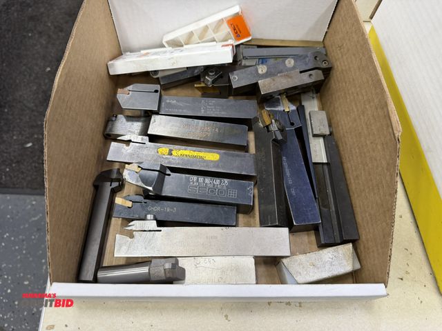 Lot 1-10267 - Large lot of assorted carbide lathe turning tool holders with assorted carbide inserts.