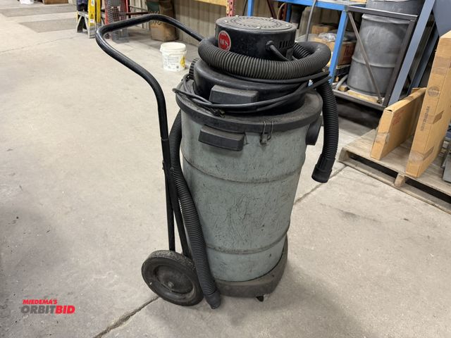Lot 1-2084 - (1) Dayton, model 6Z094, wet/dry vac with hose and attached cart (no other attachments).