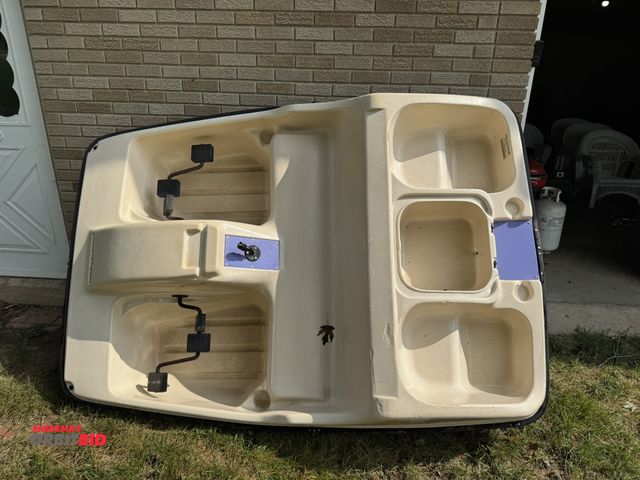 Lot 1-606 - (1) Water Wheeler 5-person capacity paddle boat, rear is missing hatch cover.