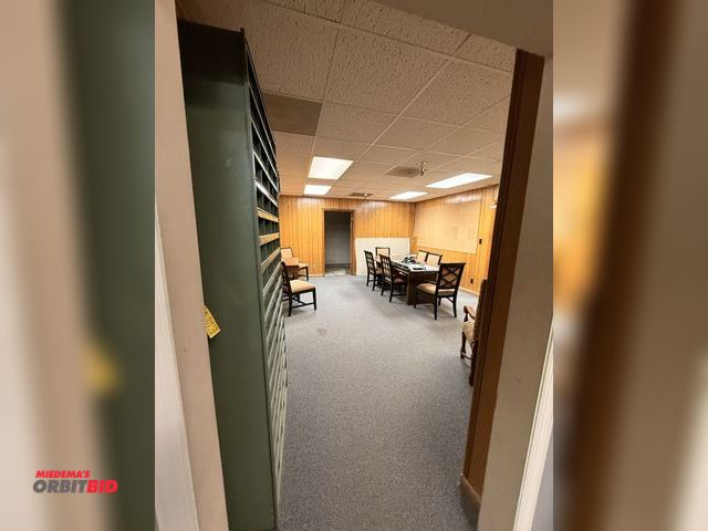 Lot 1-7529 - Contents of office; (1) Conference Table, (1) 45'' Wall Mounted Television, (8) Chairs, (1) End Tabl...