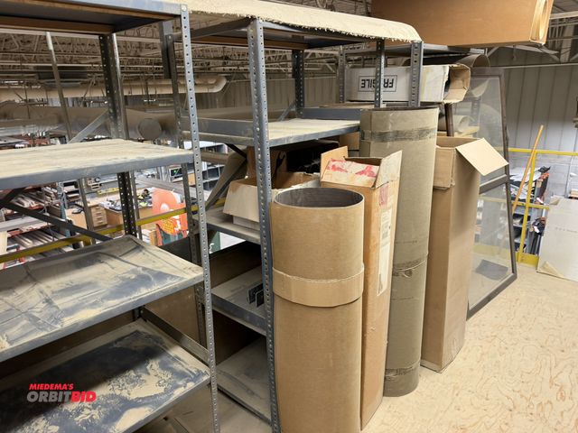 Lot 1-16651 - (3) metal shelving units, measures 36" x 24" x approx. 75" tall, with assorted wood laminate rolls, ...