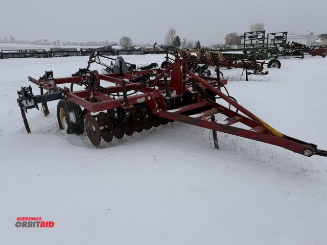 Lot 1-10428 - (1) 7-shank chisel plow with 9' wide discs, chisel plow has been fabricated with 2 outside plow poin...