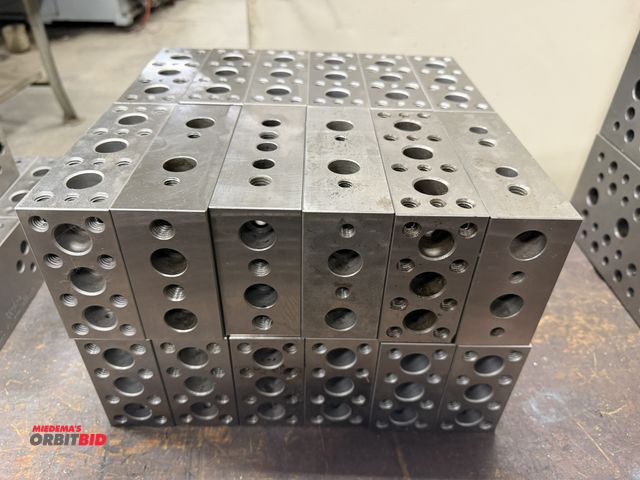 Lot 1-1892 - Lot of (24) various 6" x 3.5" x 2" blocks with threaded holes.
