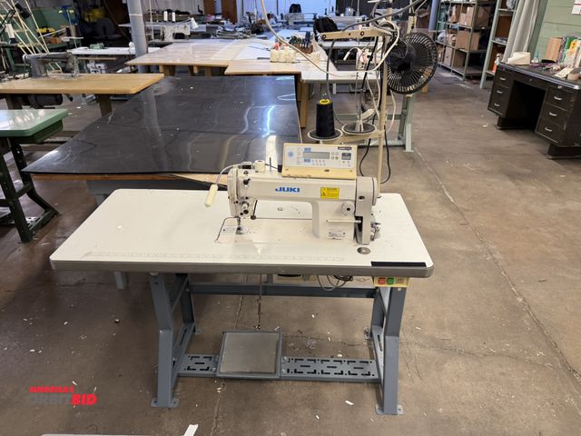 Lot 1-4729 - (1) Juki N-5410N-7 sewing machine with power table, 47.5" x 21.5" x 29.5" tall, with spool rack, Juk...