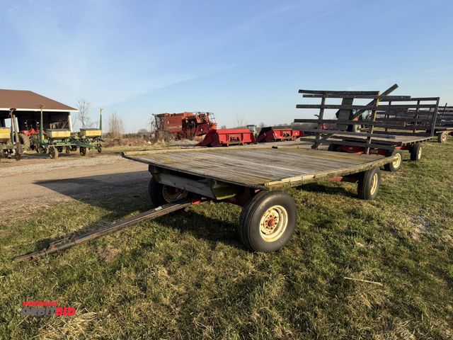 Lot 1-19117 - (1) Hay Wagon with rear rack, Knowles running gear, extendable tongue, 15' 6" long x 8' wide.