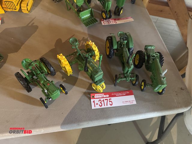 Lot 1-3175 - (4) John Deere Die Cast Tractors, including; (1) model M, (2) General Purpose, and (1) without model...