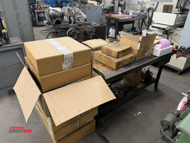 Lot 1-1761 - Large lot of assorted grinding wheels, includes Norton 16" x 1.5" x 5", USA 7" x 1/2" x 1 1/4", CGW ...