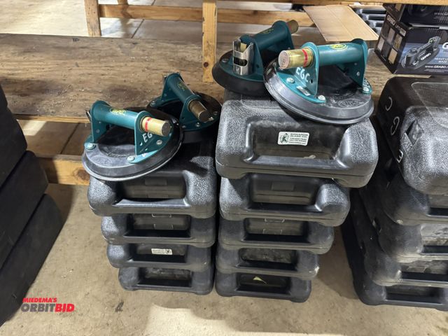 Lot 1-16445 - Lot of (13) Woods Power Grip vacuum suction cups, 125 lb. rating, 9 with cases, 4 without.