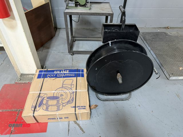 Lot 1-18718 - (1) banding cart with partial roll of 1/2" banding, includes assorted clips, and (1) new roll of Uli...