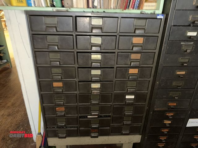 Lot 1-4713 - (1) 27-drawer metal parts cabinet, 30" wide x 14" deep x approx. 38" tall filled with assorted Welt ...