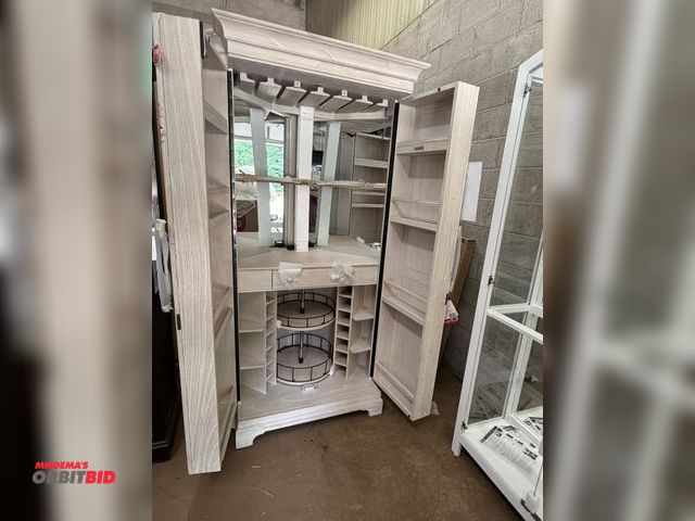Lot 1-9272 - (1) Howard Miller illuminated wine and bar cabinet, approx. 42" wide x 32" deep x 82.25" tall, model...