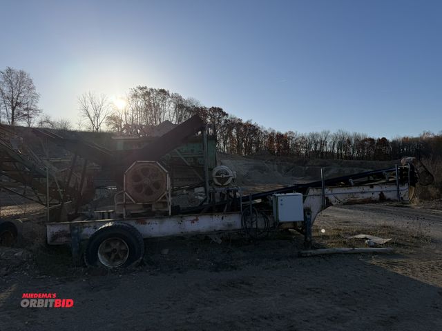 Lot 1-18296 - Iowa Mfg Company Jaw Crusher  25 HP, 3 phase motor, 220/440 V, SN: 330, 24" belt, tires need to be r...