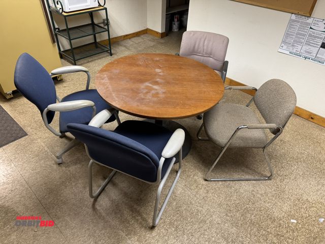 Lot 1-4617 - (1) 42" diameter, single pedestal table with (4) office style chairs.