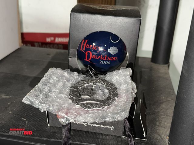 Lot 1-8257 - (1) Harley Davidson 2006 Collector Series bulb, and (1) pewter 2006 Harley Davidson wreath.