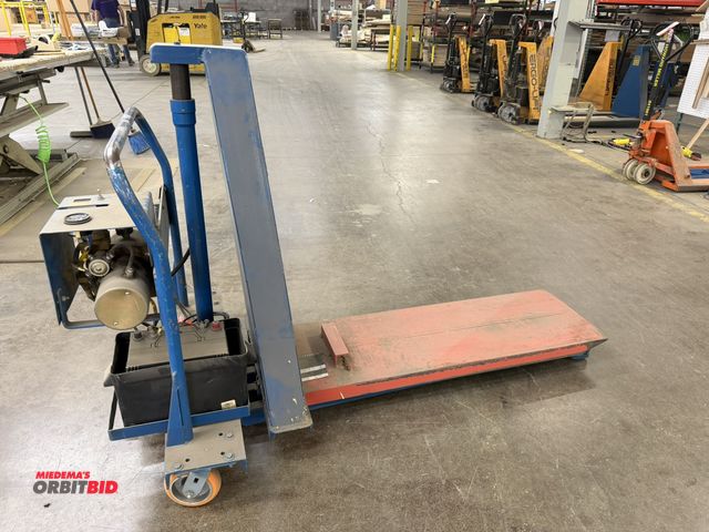 Lot 1-17353 - (1) Vestil, model unknown, 2500 lb. capacity, 12V electric pallet jack with a 16" wide x 48" long mo...